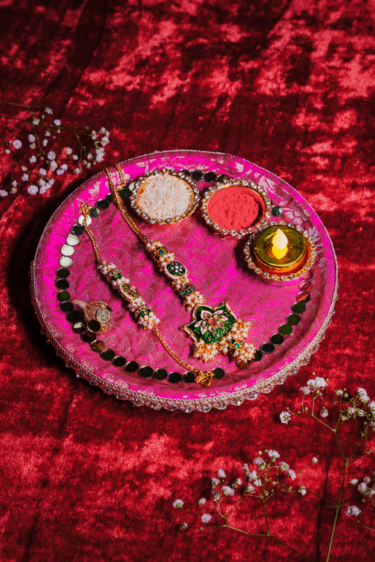 Designer magenta pooja thali for festive rituals