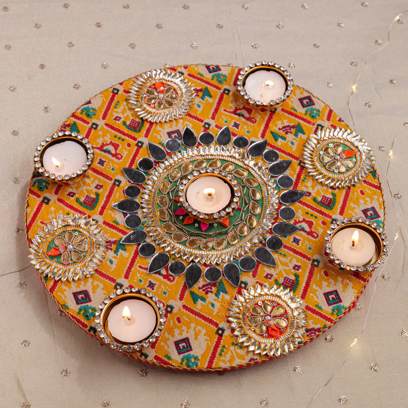 
                      
                        Decorative Rangoli with Tealight Holders
                      
                    