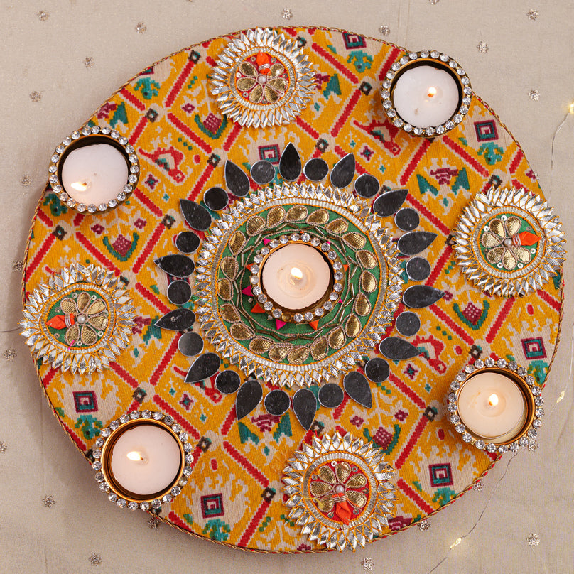 
                      
                        Decorative Rangoli with Tealight Holders
                      
                    