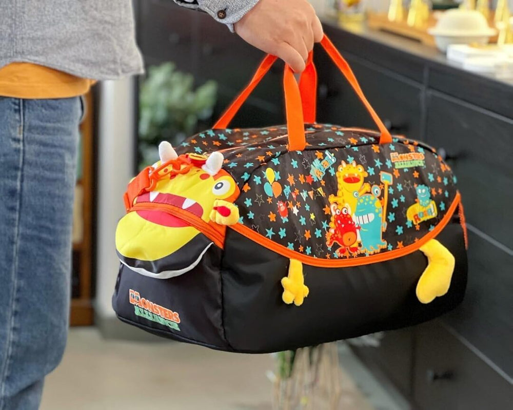 
                      
                        Kids duffle bag with cartoon monster design


                      
                    