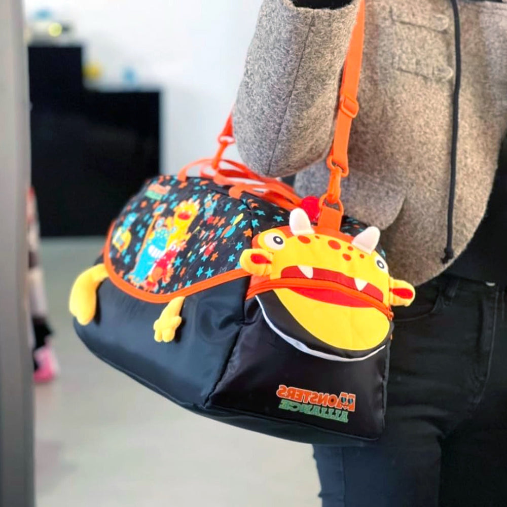 
                      
                        Kids duffle bag with cartoon monster design


                      
                    