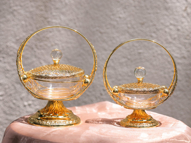 Round gold covered bowl with handle