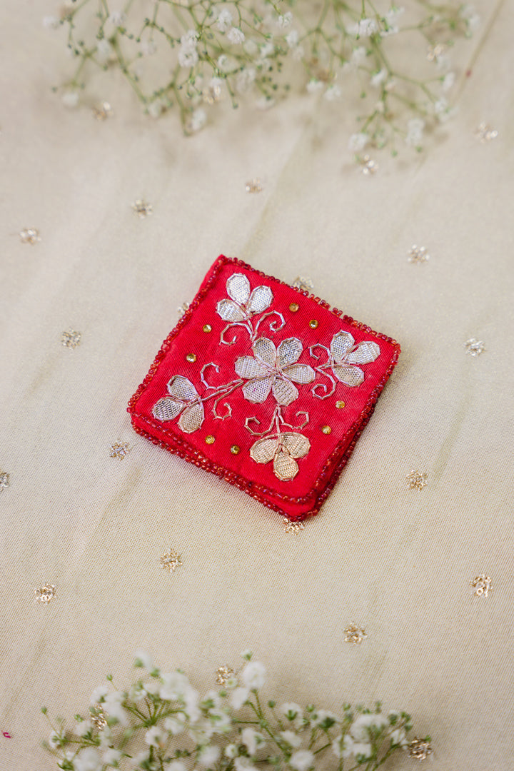 Floral embroidered handcrafted pouch with bead detailing