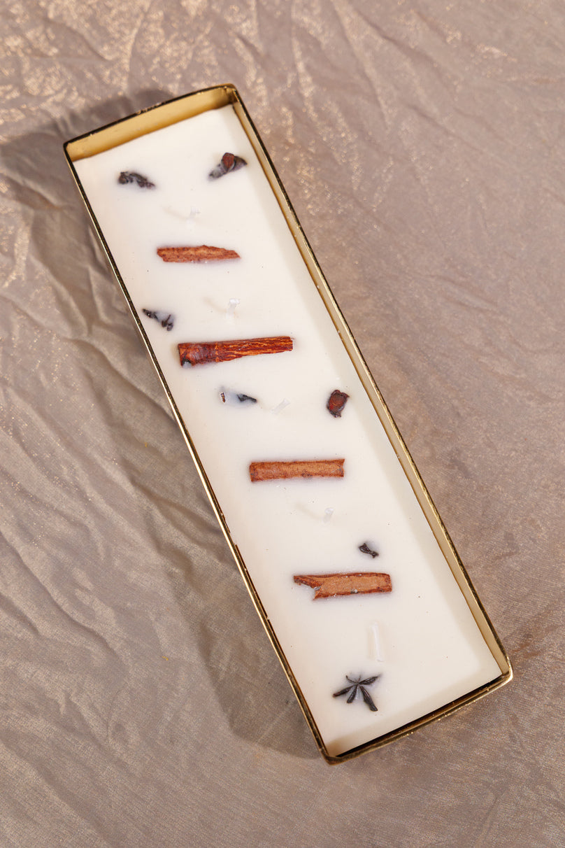 Premium golden container candle for home décor and gifting