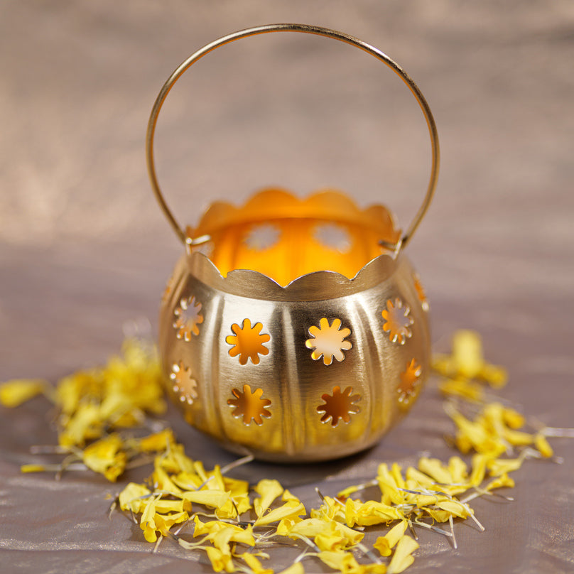Decorative golden metal lantern for Diwali and pooja