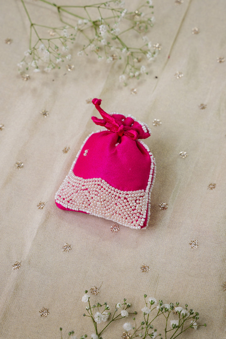 Handmade festive moti potli for pooja gifting