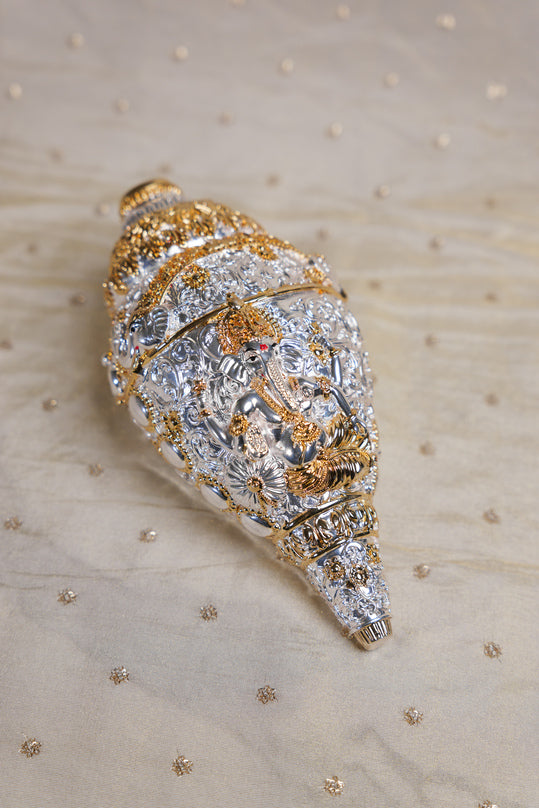 
                      
                        Ornate Silver-Golden Shankh
                      
                    
