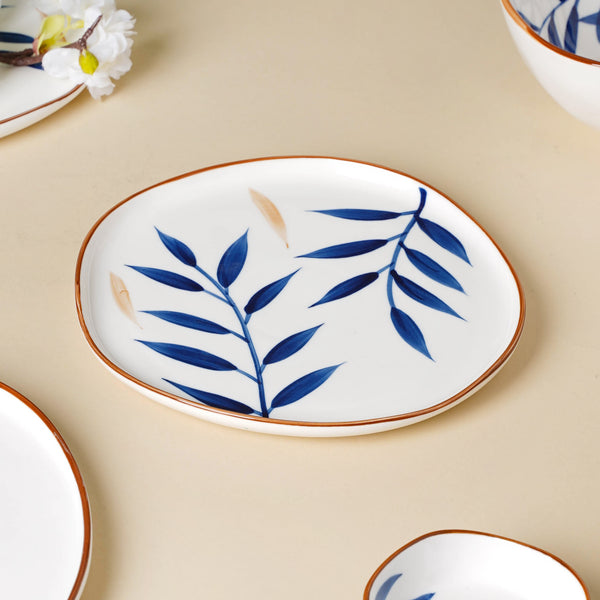 Oval serving plate with leaf accents