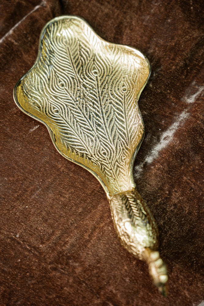 
                      
                        Peacock-Shaped Decorative Urli
                      
                    