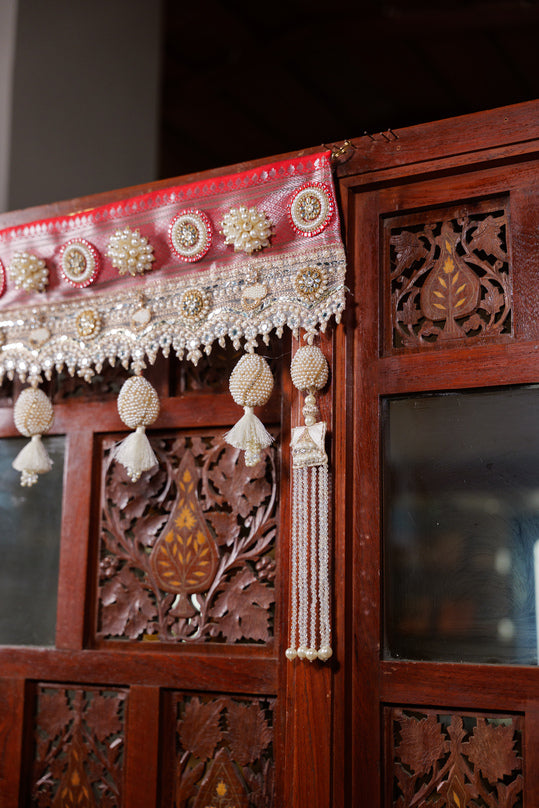 
                      
                        Pearl & Bead Embroidered Toran
                      
                    