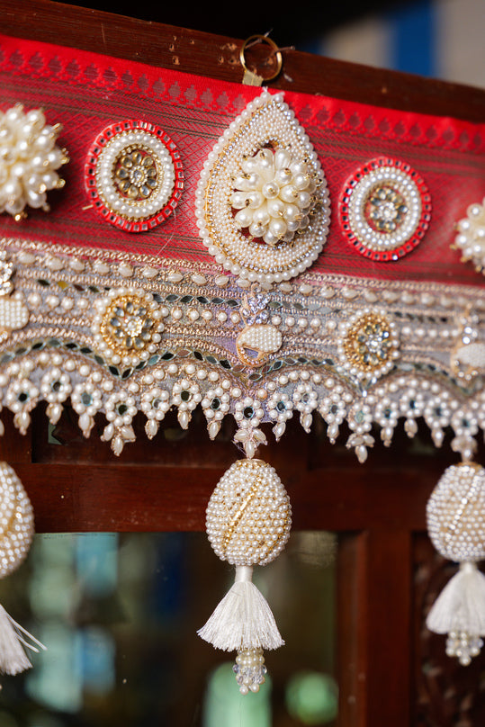 
                      
                        Pearl & Bead Embroidered Toran
                      
                    