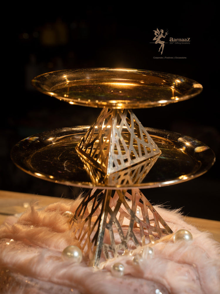 
                      
                        Round Gold Cake Platter with Geometric Base
                      
                    