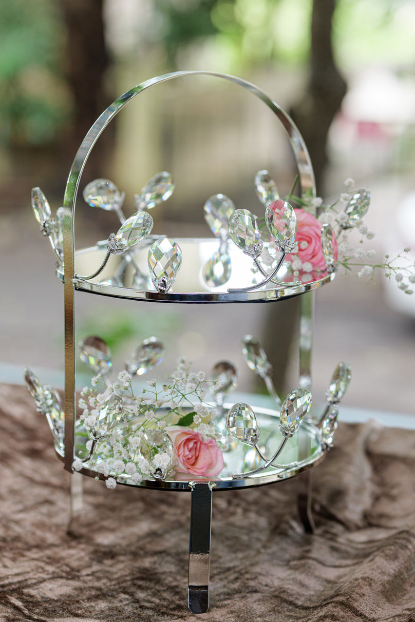 Silver crystal two tier display stand with floral design