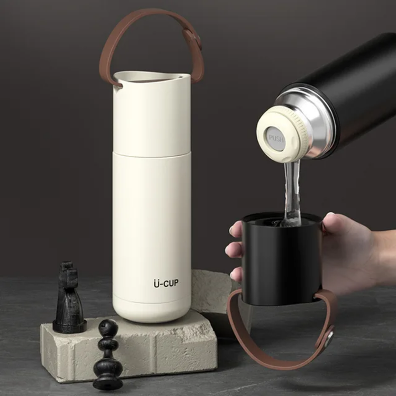 
                      
                        White Thermos Bottle 
                      
                    