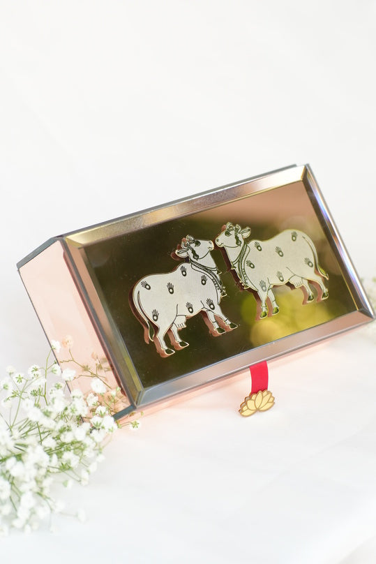 
                      
                        Twin Adorned Cow Lotus Box
                      
                    