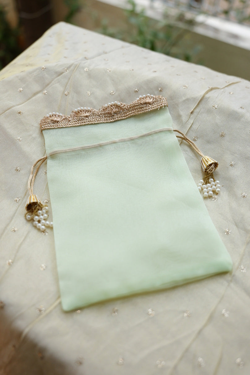 Elegant sheer gift pouch for festive use